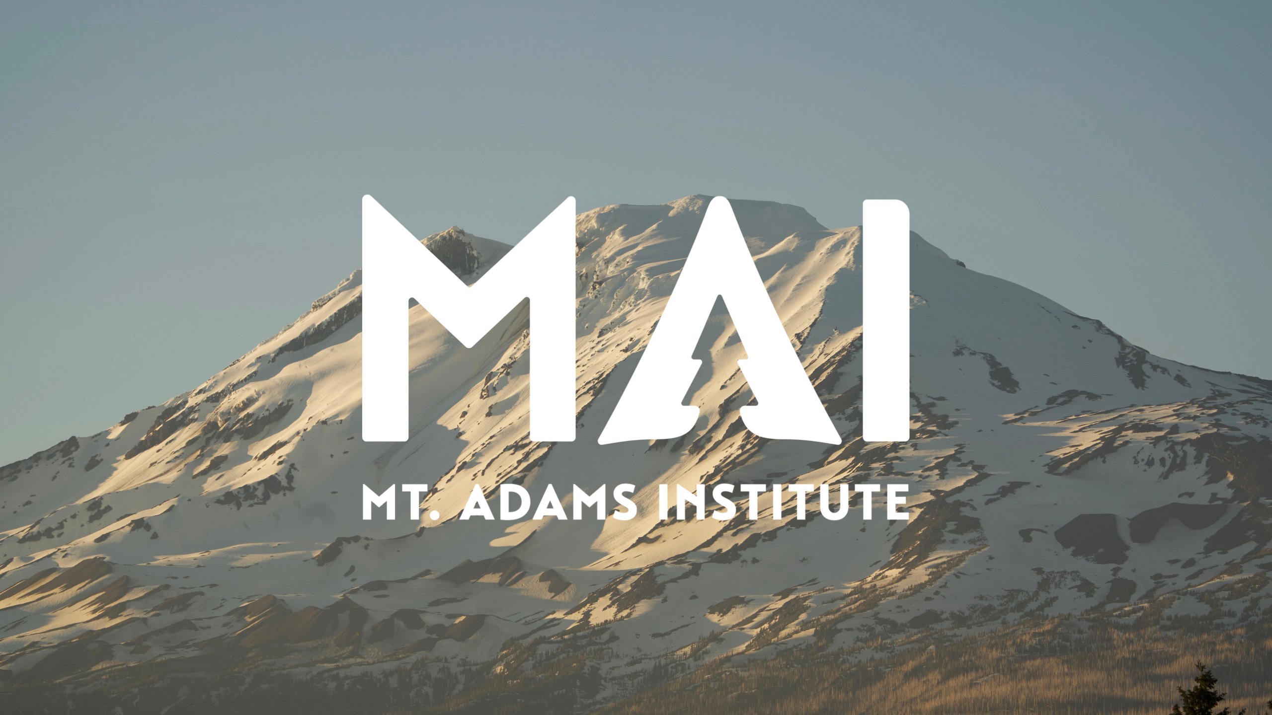 Picture of Mt. Adams with MAI logo on top of it.